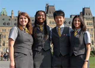Tour guides standing in front of Centre Block