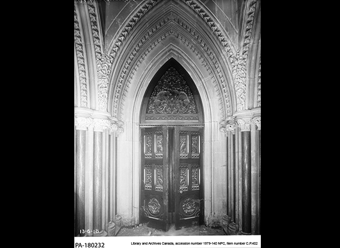 Black and white photo of the Library entrance in 1908.